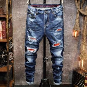 Foreign trade Europe station autumn and winter men's jeans slim personality hole patch elastic small feet casual jeans men