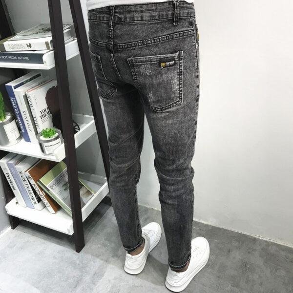 Autumn nine-point jeans men's slimming tide card hundred small feet stretch casual pants men's Korean version of the trend students