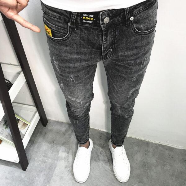 Autumn nine-point jeans men's slimming tide card hundred small feet stretch casual pants men's Korean version of the trend students