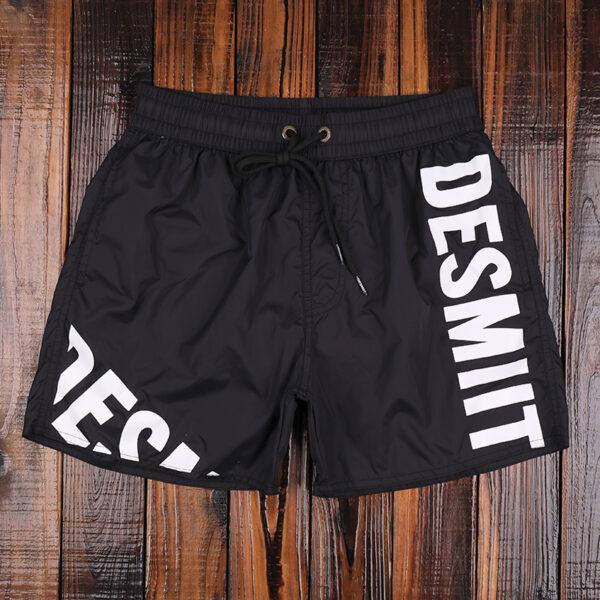 Solid-colored fast dry beach pants men's fitness sports three-point shorts are lined with beach resort hot spring swimming trunks