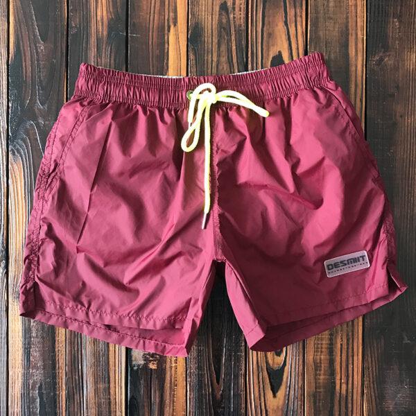 Solid-colored fast dry beach pants men's fitness sports three-point shorts are lined with beach resort hot spring swimming trunks